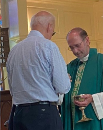 Biden receiving Communion